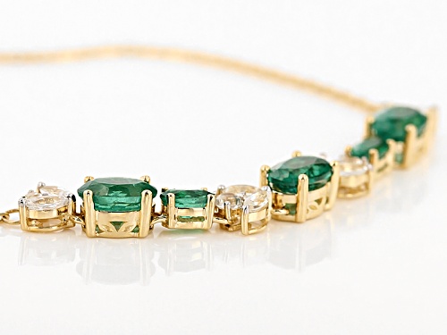 Pre-Owned 2.75ctw Oval Emerald Color Apatite And .96ctw White Zircon 10k Yellow Gold Bracelet - Size 7.5