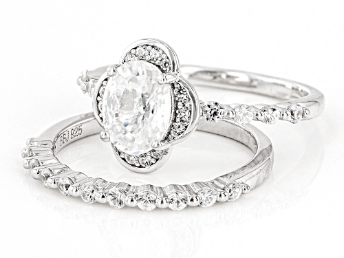 Pre-Owned 1.64ct Oval And 0.72ctw Round White Zircon Rhodium Over Sterling Silver Ring Set - Size 10