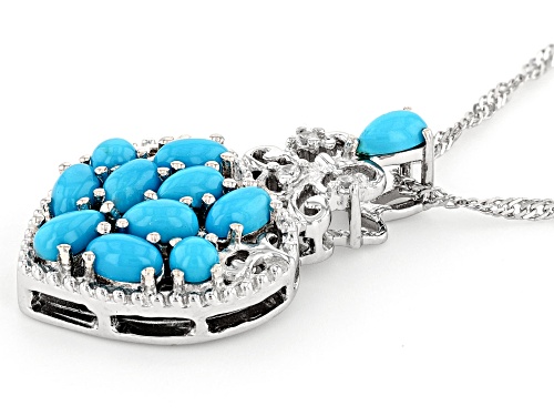 Pre-Owned 5x3mm Sleeping Beauty Turquoise & 0.05ctw  White Zircon Rhodium Over Silver Heart Pendan
