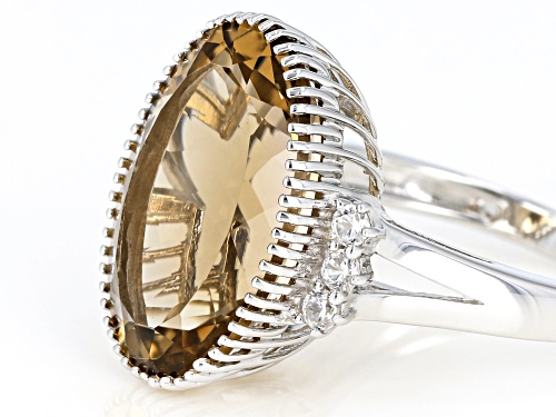 Pre-Owned 9.35ct oval champagne quartz with .30ctw white zircon rhodium over sterling silver ring - Size 6