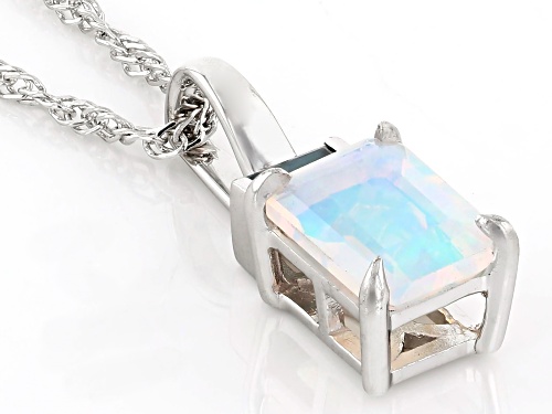 Pre-Owned 0.75ct Ethiopian Opal With 0.12ct London Blue Topaz Rhodium Over Sterling Silver Pendant w