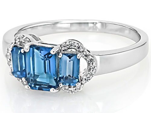 Pre-Owned 1.72ctw Rectangular Octagonal London Blue Topaz With 0.13ctw White Zircon Rhodium Over Sil - Size 8