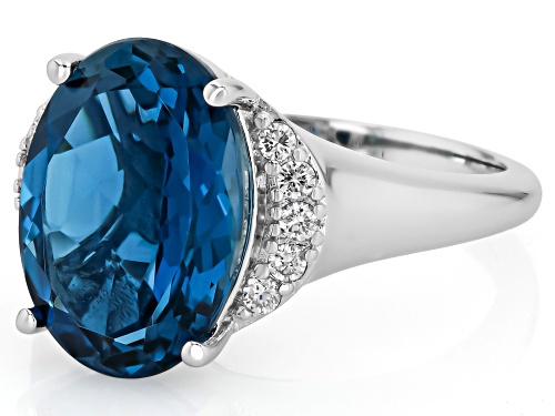 Pre-Owned 6.56ct Oval London Blue Topaz With .11ctw White Prazana® Lab Grown Diamonds Rhodium Over S - Size 6