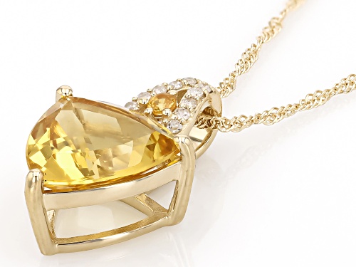 Pre-Owned 2.40ct Yellow Beryl with 0.04ct Yellow Sapphire 0.06ctw White Diamond 10k Yellow Gold Pend