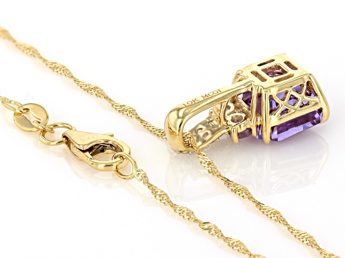 Pre-Owned 3.33 Lab Color Change Sapphire & 0.07ctw Lab White Sapphire 10k Yellow Gold Pendant with C
