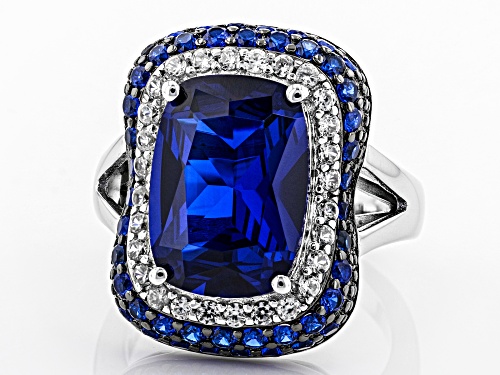 6.70ctw Lab Created Blue Spinel With .47ctw Zircon Rhodium Over Sterling Silver Ring - Size 7