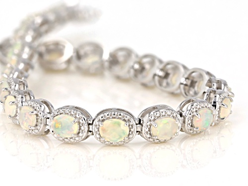 4.13CTW OVAL ETHIOPIAN OPAL WITH .02CTW WHITE 4 DIAMOND ACCENT RHODIUM OVER SILVER BRACELET - Size 8