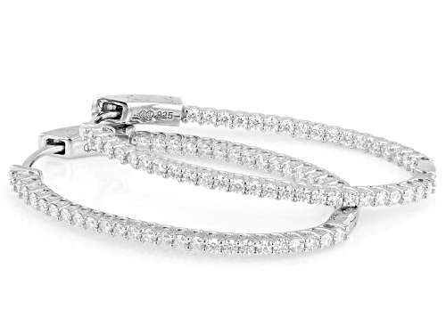 Pre-Owned MOISSANITE FIRE® 1.68CTW DEW ROUND BRILLIANT PLATINEVE® INSIDE OUT OVAL HOOP EARRINGS