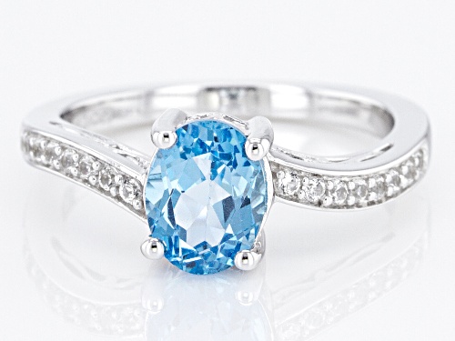 Pre-Owned 1.15ctw Oval Swiss Blue Topaz with .48ctw Lab Created White Sapphire 10K White Gold Ring - Size 9.5