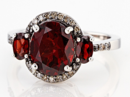 Pre-Owned 3.56ctw Oval Vermelho Garnet(TM) & .12ctw Round Champagne Diamond Rhodium Over Silver Ring - Size 8