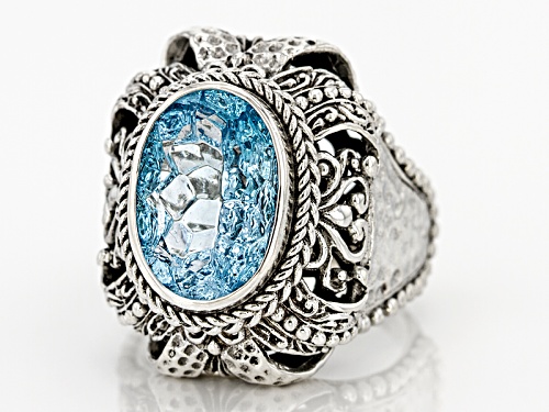 Pre-Owned Artisan Gem Collection Of Bali™ 14x10mm Oval Carved Blue Topaz Sterling Silver Solitaire R - Size 11