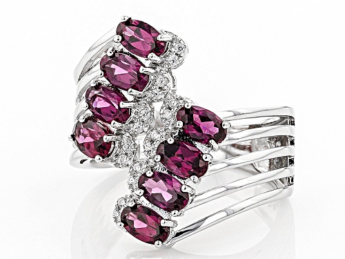 Pre-Owned 2.25ctw Oval Raspberry color Rhodolite And .05ctw Round White Zircon Silver Bypass Ring - Size 5
