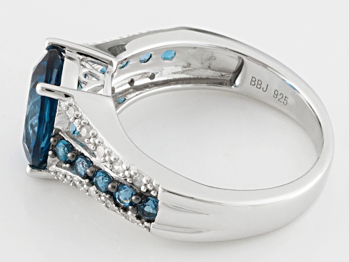 Pre-Owned 3.23ctw Oval And Round London Blue Topaz With .10ctw White Diamond Sterling Silver Ring - Size 5