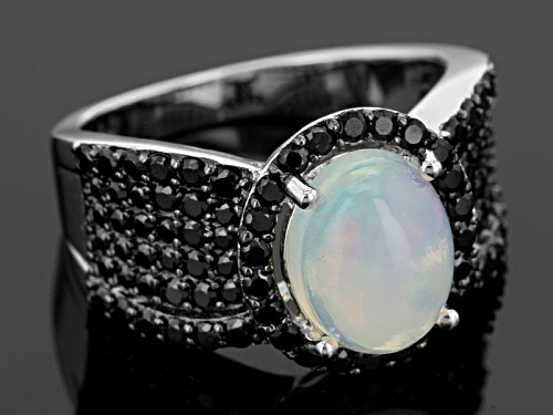 Pre-Owned 1.50ct Oval Ethiopian Opal With .94ctw Round Black Spinel Sterling Silver Ring - Size 4