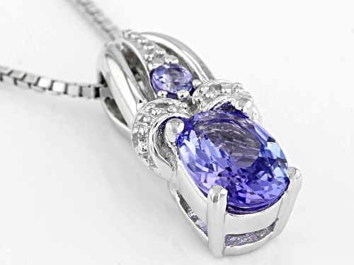 Pre-Owned .67ctw Oval & Round Tanzanite With .01ctw Four Diamond Accents Rhodium Over Silver Pendant