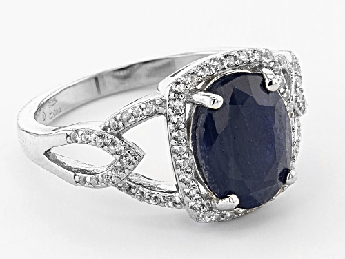 Pre-Owned 3.00ct Oval Blue Sapphire With .48ctw Round White Zircon Rhodium Over Sterling Silver Ring - Size 6