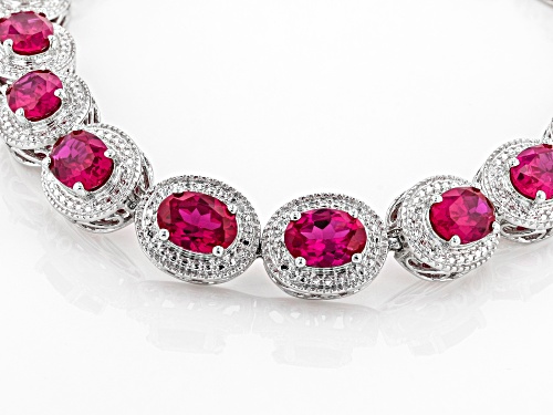 Pre-Owned 12.50ctw Oval Lab Created Ruby With White Diamond Accent Rhodium Over Sterling Silver Brac - Size 8