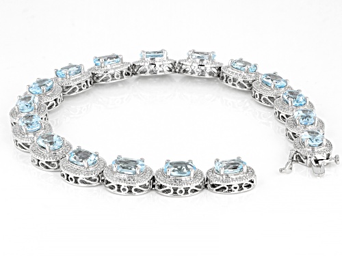 Pre-Owned 18.33ctw Oval Sky Blue Topaz With Round White Diamond Accent Rhodium Over Sterling Silver - Size 8
