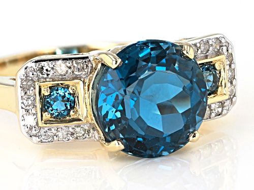 Pre-Owned 3.95ctw Round London Blue Topaz With .13ctw Round White Diamonds 10k Yellow Gold Ring - Size 6