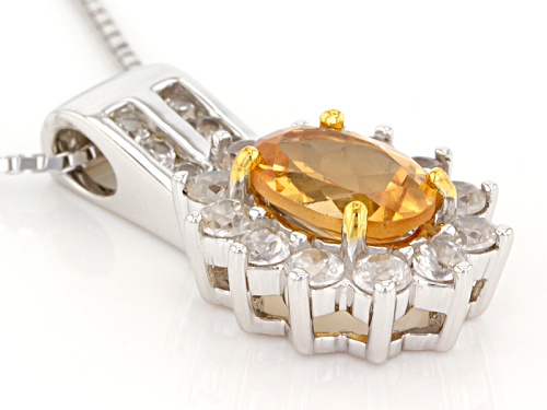 1.16ct Oval Imperial Hessonite™ With .71ctw Round White Zircon Sterling Silver Pendant With Chain