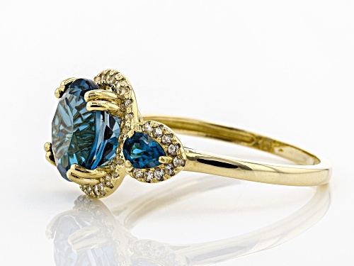 4.15ctw Round And Pear Shape London Blue Topaz With .42ctw Round White Zircon 10k Yellow Gold Ring - Size 9