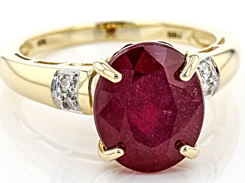 5.52ct Oval Mahaleo® Ruby With .05ctw Round White Four Diamond Accents 10k Yellow Gold Ring - Size 8