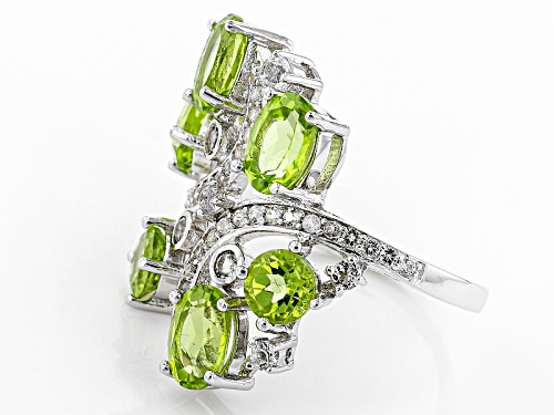 4.60ctw Oval And Round Manchurian Peridot™ With .69ctw Round White Topaz Sterling Silver Ring - Size 7