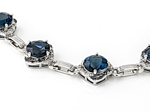 15.04ctw London Blue Topaz with 0.38ctw White & Blue Diamonds Rhodium Over Sterling Silver Bracelet - Size 8