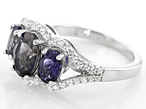 1.62ctw Oval Iolite And .47ctw Round White Zircon Rhodium Over Sterling Silver 3-Stone Ring - Size 8