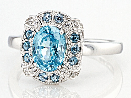 1.70ct oval blue zircon, .17ctw Swiss blue topaz, .15ctw zircon rhodium over sterling silver ring - Size 10