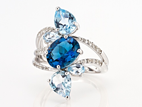 5.67CTW MIXED SHAPES LONDON BLUE TOPAZ, SKY BLUE TOPAZ & .15CTW WHITE TOPAZ RHODIUM OVER SILVER RING - Size 7
