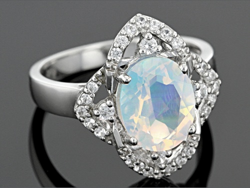1.49ct Oval Lab Created Opal And .23ctw Round White Zircon Sterling Silver Ring - Size 7