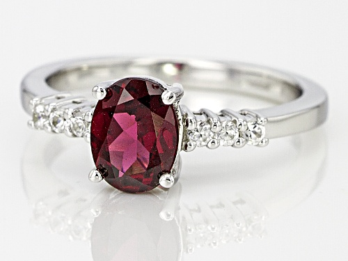 1.29ct Oval Raspberry Color Rhodolite And .17ctw Round White Zircon Sterling Silver Ring - Size 9