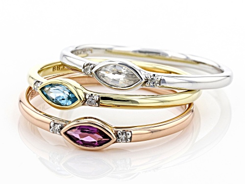 0.45ctw Swiss Blue Topaz, Rhodolite Garnet, White Zircon, And Diamond 10k Gold Ring Set Of 3 - Size 8