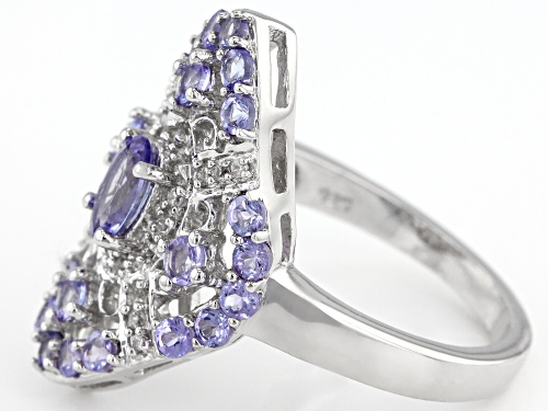 1.47CTW OVAL AND ROUND TANZANITE WITH .12CTW WHITE ZIRCON RHODIUM OVER STERLING SILVER RING - Size 6