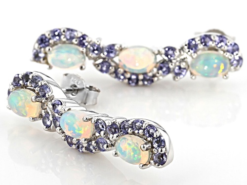1.53CTW OVAL CABCHON ETHIOPIAN OPAL WITH 1.29CTW TANZANITE RHODIUM OVER STERLING SILVER EARRINGS
