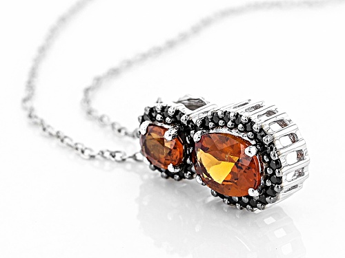 1.61ctw Oval red Hessonite With .30ctw Round Black Spinel Sterling Silver Pendant With Chain