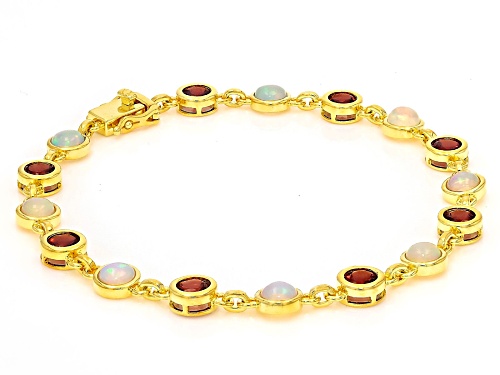 2.40ctw Ethiopian Opal, 3.74ctw Red Garnet 18k Yellow Gold Over Sterling Silver Bracelet - Size 7.25