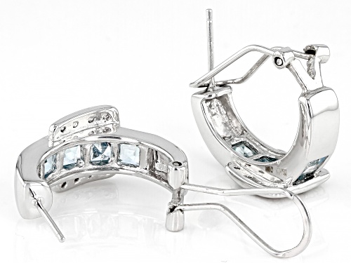 3.24ctw Blue Topaz With .02ctw Diamond Accent Rhodium Over Sterling Silver Huggie Earrings