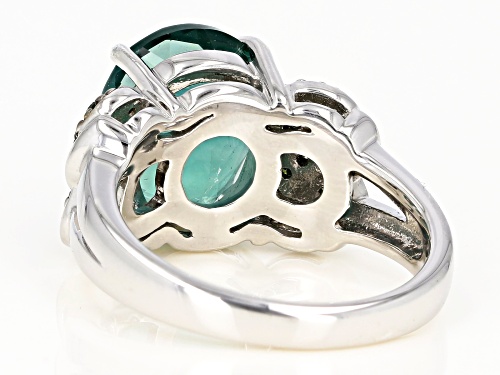 4.42CT OVAL TEAL FLUORITE WITH .09CTW GREEN DIAMOND ACCENT RHODIUM OVER SILVER RING - Size 7