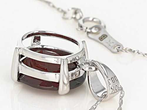 3.65ct oval red hessonite garnet Rhodium Over 10k white gold solitaire pendant with chain.