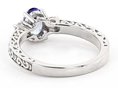 0.28ctw Oval tanzanite with 0.75ct round lab Created sapphire rhodium over sterling silver ring - Size 10