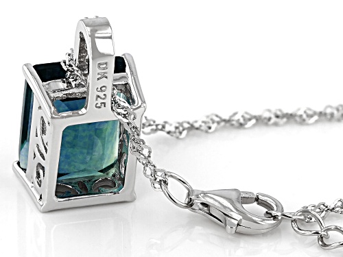 6.46ct Emerald Cut Teal Fluorite and .12ctw Zircon Rhodium Over Silver Pendant With Chain