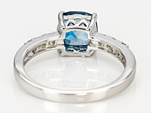 1.42CT SQUARE CUSHION LONDON BLUE TOPAZ WITH .22CTW GREEN SAPPHIRE RHODIUM OVER STERLING SILVER RING - Size 9