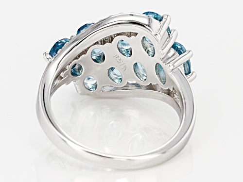 5.38ctw oval blue and round white zircon rhodium over sterling silver bypass ring - Size 10