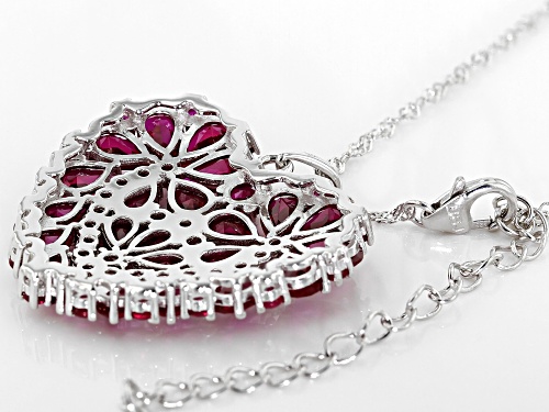 7.96ctw Pear Shape & Round Lab Created Ruby Rhodium Over Silver Heart Pendant With Chain
