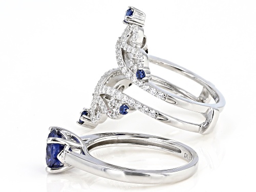 Bella Luce ® 3.92ctw Esotica ™ Tanzanite and White Diamond Simulants Rhodium Over Sterling Ring - Size 7