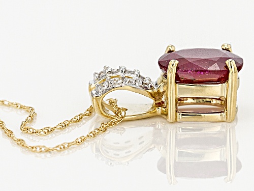 1.36ct Oval Mozambique Ruby With .06ctw Round White Zircon 14k Gold Pendant With Chain.