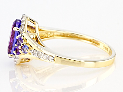 1.90ctw Oval And Round Tanzanite With .12ctw Round White Diamonds 14k Yellow Gold Ring - Size 6