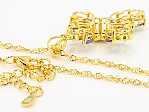 2.10ctw Tanzanite And 0.44ctw Lab Sapphire 18k Yellow Gold Over Silver Cross Pendant With Chain